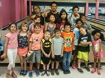 Young children participating in Taekwondo training and outdoor sports at the best martial arts summer camp in Toronto.